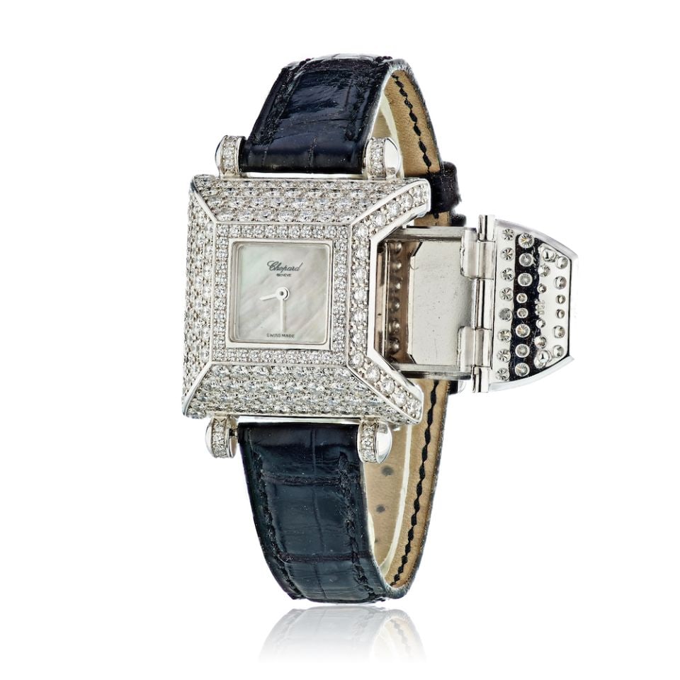 Chopard Classique Femme 18K White Gold Diamond Secret Compartment Wristwatch: Chopard Classique Femme 18K White Gold Diamond Secret Compartment Wristwatch Vintage Chopard Classique Femme secret compartment watch in 18K white gold with a square case, quartz movement, and diamond