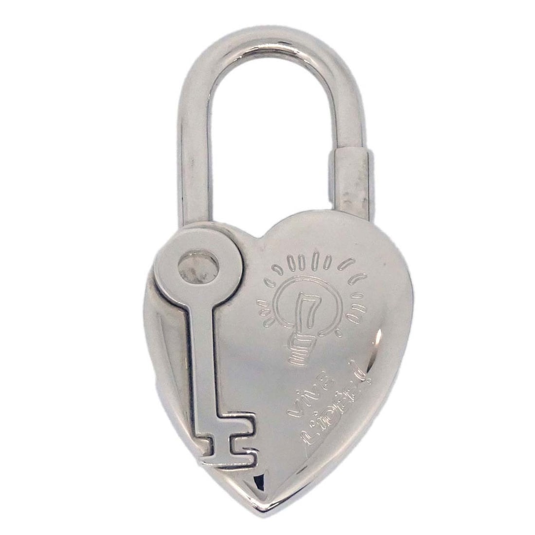 Hermes Annee De La Fantaisie Silver Plated Cadena Charm: Hermes Annee De La Fantaisie Silver Plated Cadena Charm Vintage Hermes Annee De La Fantaisie Cadena padlock bag charm in silver plated metal. This small unisex charm has a classic padlock form and sho