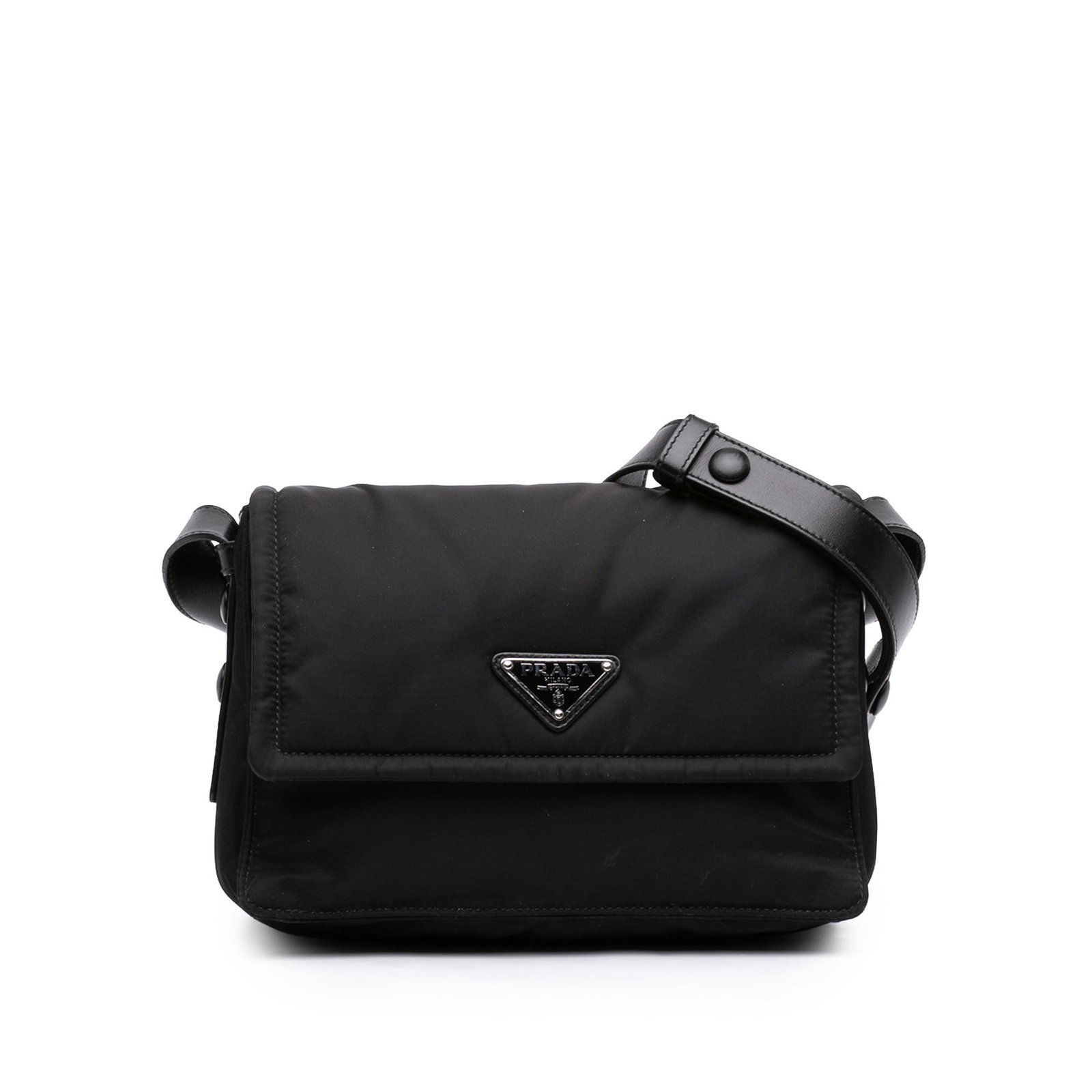 Prada Re Nylon Padded Traveller Small Crossbody Bag Black: Prada Re Nylon Padded Traveller Small Crossbody Bag Black Prada Small Re Nylon Padded Traveller Crossbody in black with a nylon body and leather trim. This crossbody features a flat leather shoulder s