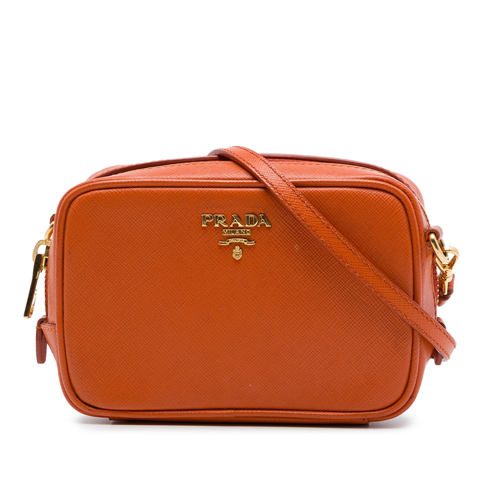 Prada Saffiano Camera crossbody bag in orange leather: Prada Saffiano Camera crossbody bag in orange leather Prada Saffiano Camera Bag in orange saffiano leather with a crossbody silhouette. It features a flat leather strap, top zip closure, and an interi