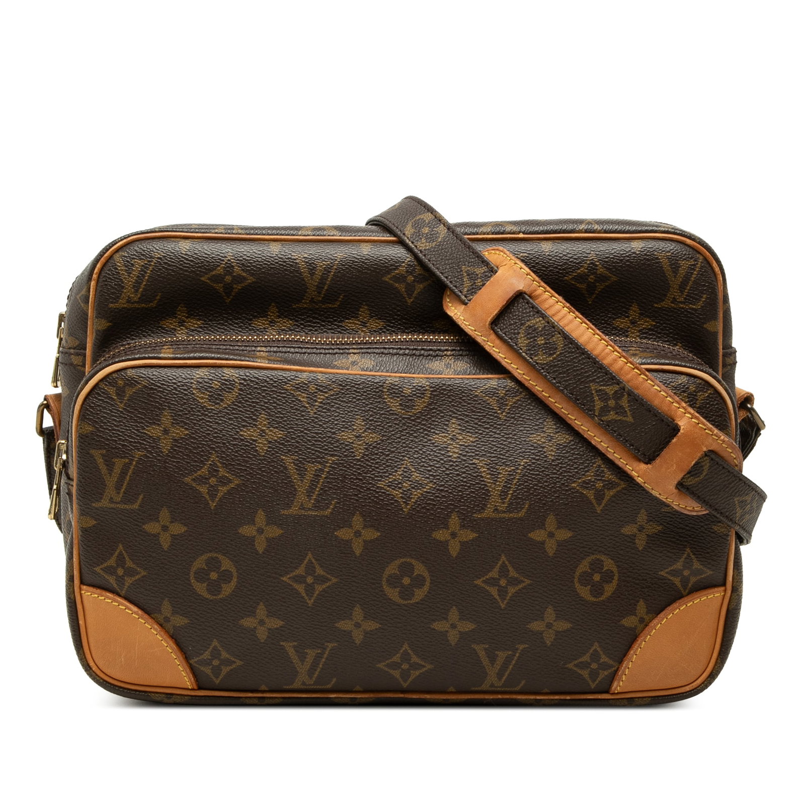 Louis Vuitton Monogram Nil Shoulder Bag in Brown Canvas: Louis Vuitton Monogram Nil Shoulder Bag in Brown Canvas Louis Vuitton Monogram Nil Crossbody bag crafted with a monogram canvas body and vachetta leather trim. It features an adjustable flat shoulder 