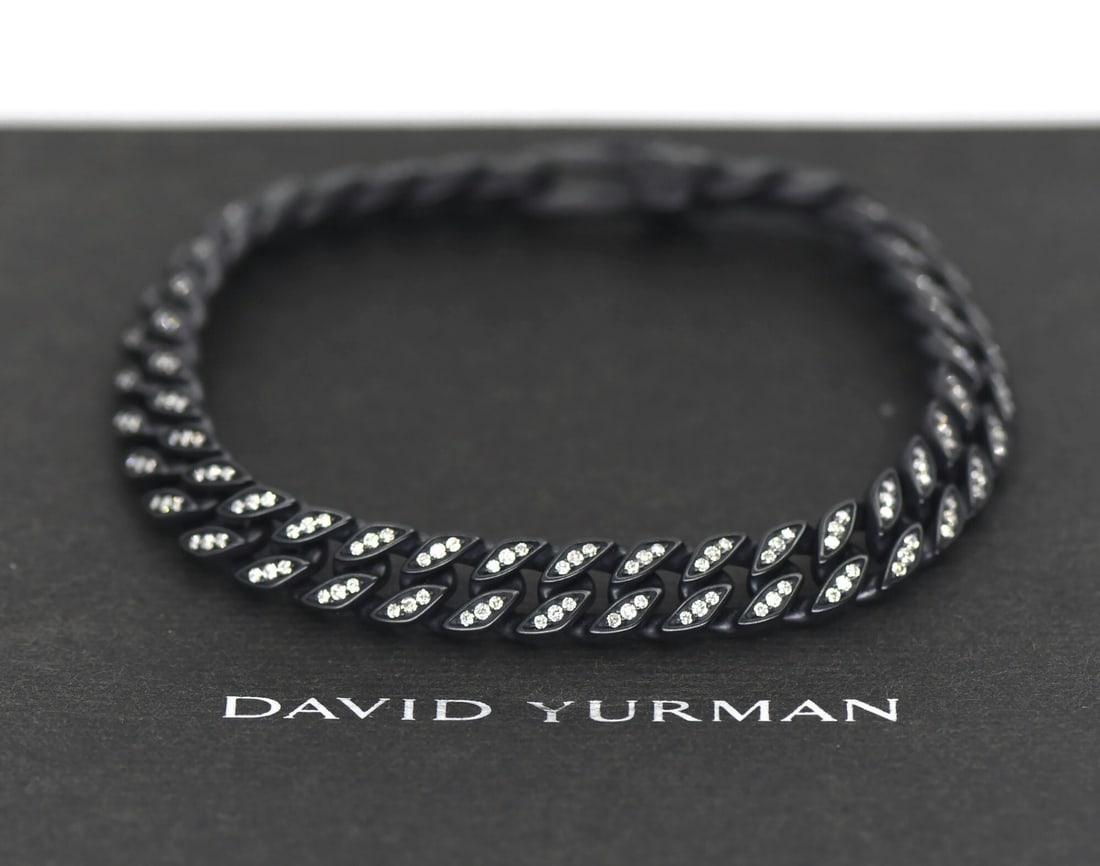 David Yurman titanium chain bracelet with diamonds 8mm 8.5 inches: David Yurman titanium chain bracelet with diamonds 8mm 8.5 inches David Yurman curb chain bracelet crafted in titanium with diamond accents. This pre-owned bracelet features a classic chain style and 