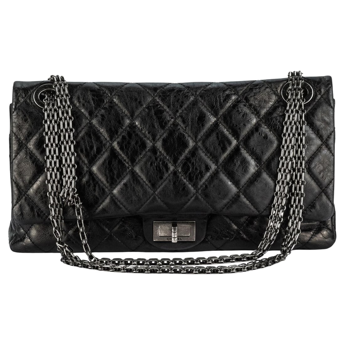 Chanel Black Reissue Double Flap Bag 227 with Authenticity Card: Chanel Black Reissue Double Flap Bag 227 with Authenticity Card This exquisite Chanel Black Reissue Double Flap Bag 227 is a remarkable piece crafted from distressed diamond quilted calfskin leather, 