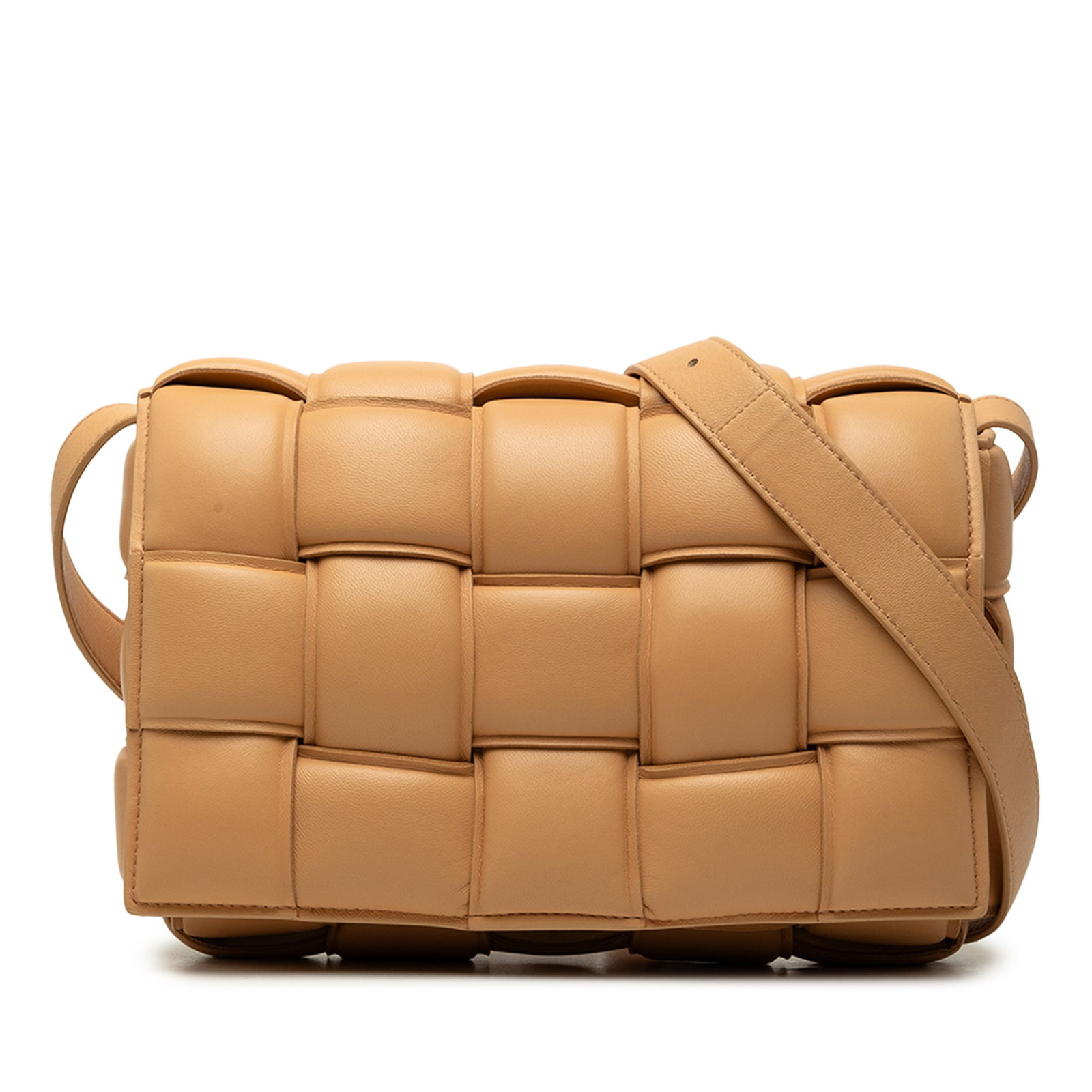 Bottega Veneta Padded Cassette Crossbody in Brown Nappa Leather: Bottega Veneta Padded Cassette Crossbody in Brown Nappa Leather A Bottega Veneta Padded Cassette crossbody crafted in woven nappa leather with the signature Intrecciato design. This brown bag features