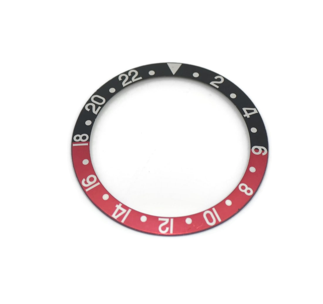 Rolex 16710 Coke Bezel Insert for GMT Master: Rolex 16710 Coke Bezel Insert for GMT Master Pre-owned Rolex GMT-Master Coke insert 16710. This is an authentic insert made in Switzerland and designed for compatibility with Rolex GMT-Master models. 