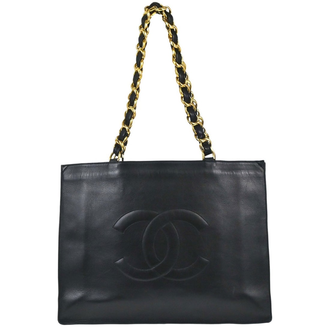 CHANEL Large Black Lambskin Quilted Tote Shoulder Bag: CHANEL Large Black Lambskin Quilted Tote Shoulder Bag Black quilted lambskin Chanel tote shoulder bag with chain shoulder straps and interior pocket storage. Made in France, this large shoulder bag in