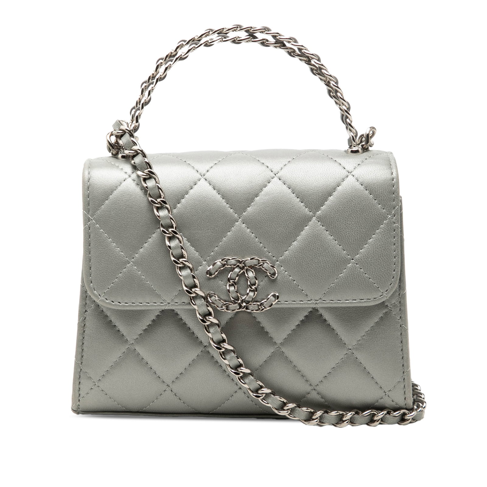 Chanel Mini CC top handle chain clutch in metallic silver lambskin: Chanel Mini CC top handle chain clutch in metallic silver lambskin A Chanel Mini CC Metallic Lambskin Top Handle Clutch With Chain crafted in silver quilted lambskin leather. This bag features a twist