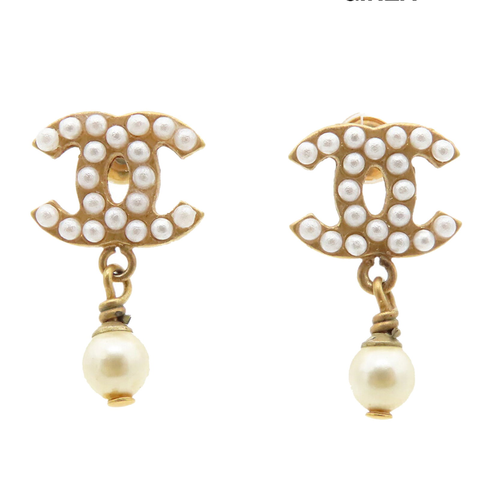 Chanel CC Faux Pearl Gold Plated Drop Earrings Push Back: Chanel CC Faux Pearl Gold Plated Drop Earrings Push Back Chanel swing earrings featuring the iconic CC motif with faux pearl accents and push back closures. Crafted in gold plated metal, this pair is 