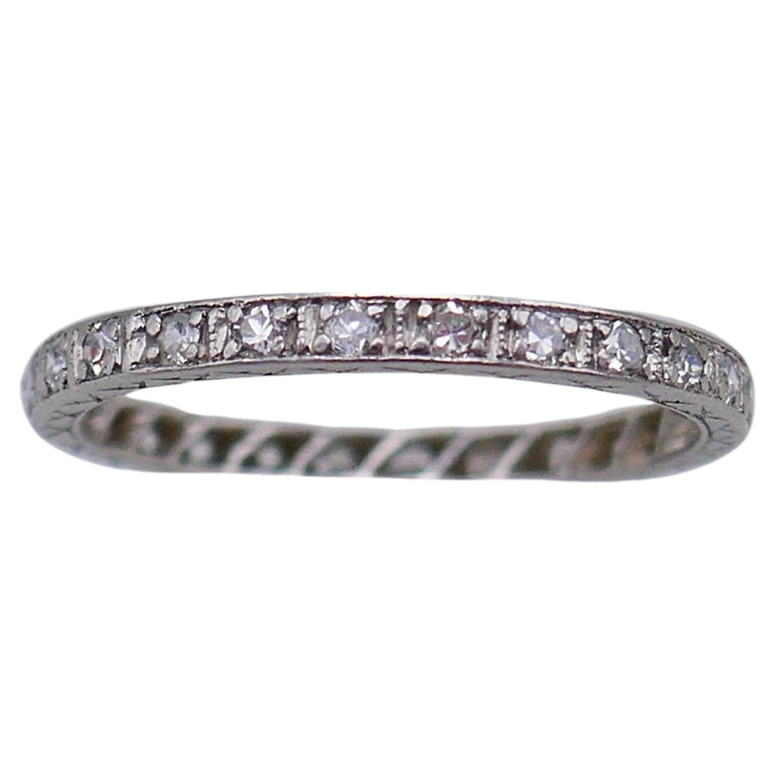 Platinum Diamond Band Ring Art Deco 0.26 Carat Size 5.5: Platinum Diamond Band Ring Art Deco 0.26 Carat Size 5.5 Art Deco platinum band ring featuring 26 single cut diamonds with edging detail on the platinum. The ring is sized at 5.5 US and is in excellent