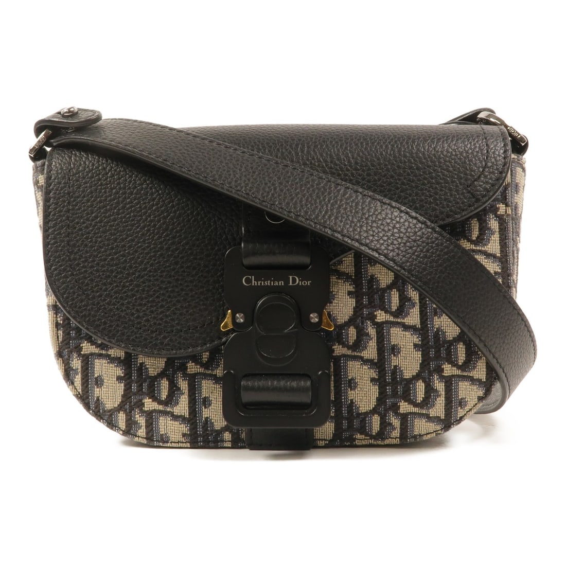 Dior Mini Saddle Messenger Shoulder Bag in Blue Canvas: Dior Mini Saddle Messenger Shoulder Bag in Blue Canvas A Christian Dior Mini Saddle Messenger shoulder bag in blue canvas with silver-tone hardware. This women's bag features a flap design with one op
