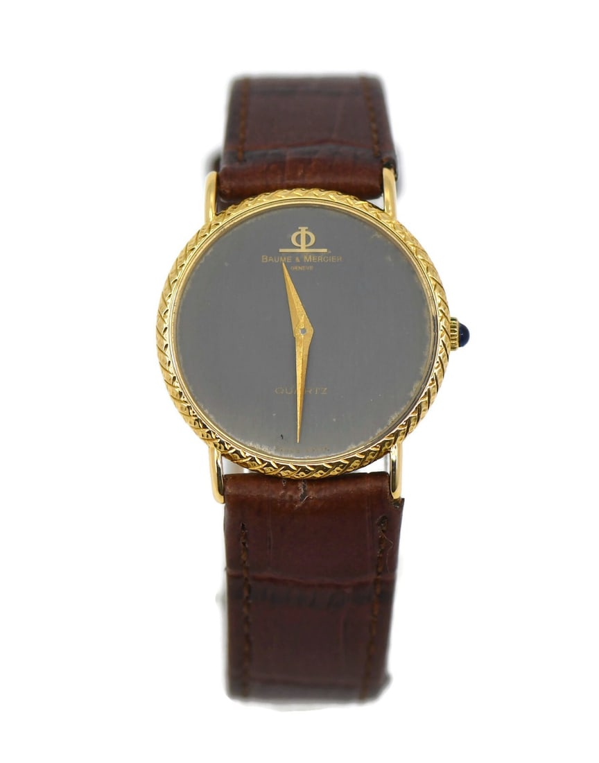 Baume & Mercier Baume mens 18K yellow gold quartz wristwatch 15138: Baume & Mercier Baume mens 18K yellow gold quartz wristwatch 15138 Pre-owned Baume & Mercier men's wristwatch with a quartz movement and analog display. This Swiss-made watch features an 18K yellow go