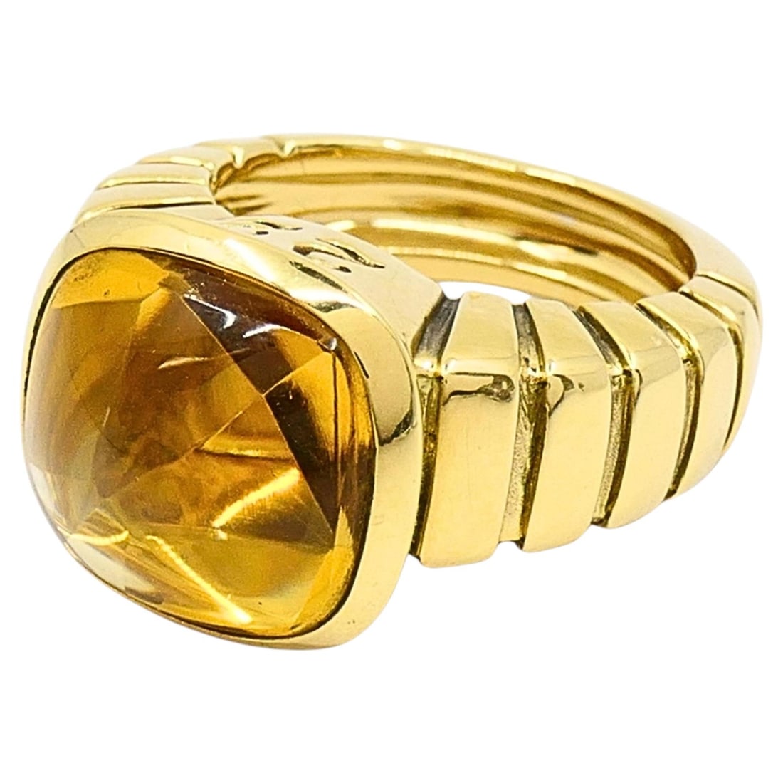 Van Cleef Arpels Facade 18k Yellow Gold Citrine Ring: Van Cleef Arpels Facade 18k Yellow Gold Citrine Ring Vintage Van Cleef & Arpels "Facade" cocktail ring crafted in 18k yellow gold and set with a citrine sugarloaf cabochon. The citrine is mounted in a