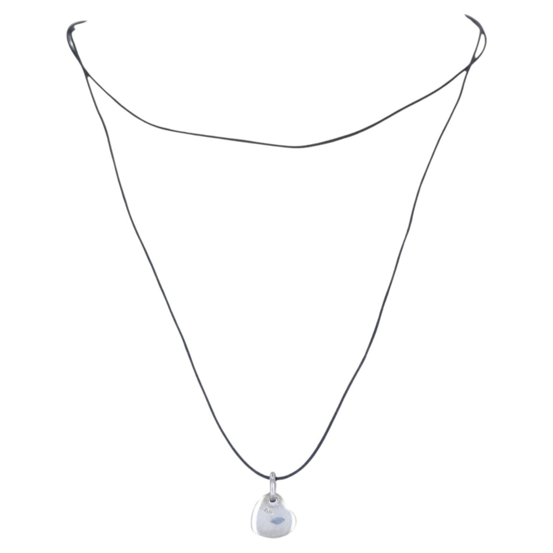 Pomellato Heart Pendant Necklace in Sterling Silver on Black Cord: Pomellato Heart Pendant Necklace in Sterling Silver on Black Cord Pomellato heart pendant necklace in sterling silver with a softly rounded, polished heart charm suspended from an adjustable black cor