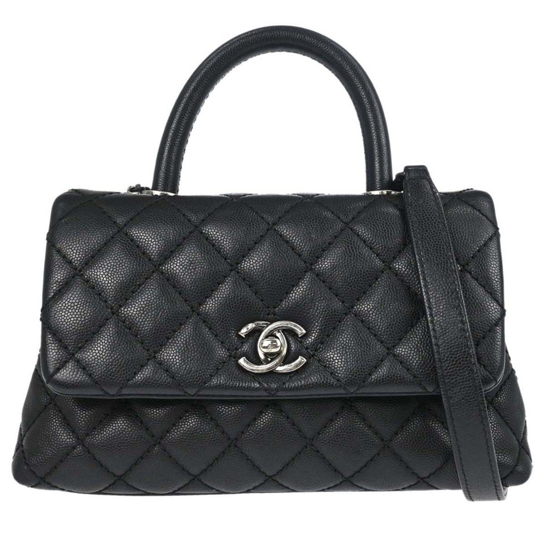 CHANEL Coco Handle black calfskin top handle bag with strap: CHANEL Coco Handle black calfskin top handle bag with strap Chanel Coco Handle 2way handbag in black caviar skin leather with a turn lock closure and top handle silhouette. This medium women's bag fea