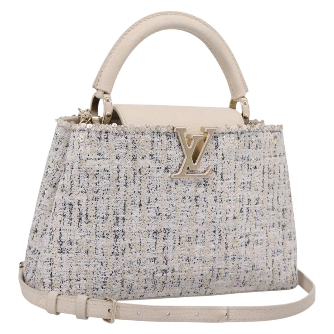 Louis Vuitton Capusines Ivory Canvas Hand Bag with Strap: Louis Vuitton Capusines Ivory Canvas Hand Bag with Strap Louis Vuitton Capusine handbag in ivory canvas with a structured silhouette and included dust bag and shoulder strap. Made in France, this wome