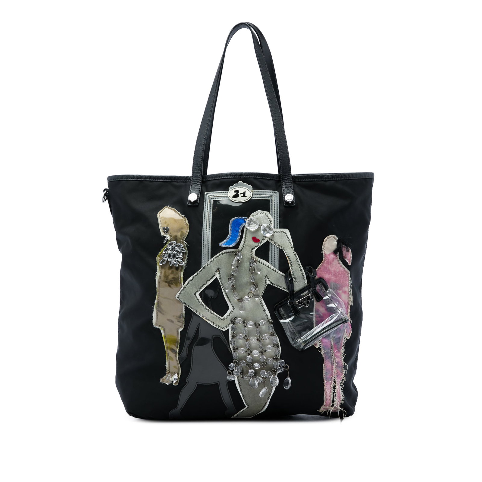 Prada Tessuto Fashion Doll Tote with Saffiano Leather Trim: Prada Tessuto Fashion Doll Tote with Saffiano Leather Trim Prada Saffiano Trimmed Tessuto Fashion Doll Tote in black with a nylon body, patchwork details, and saffiano leather trim. It features flat l