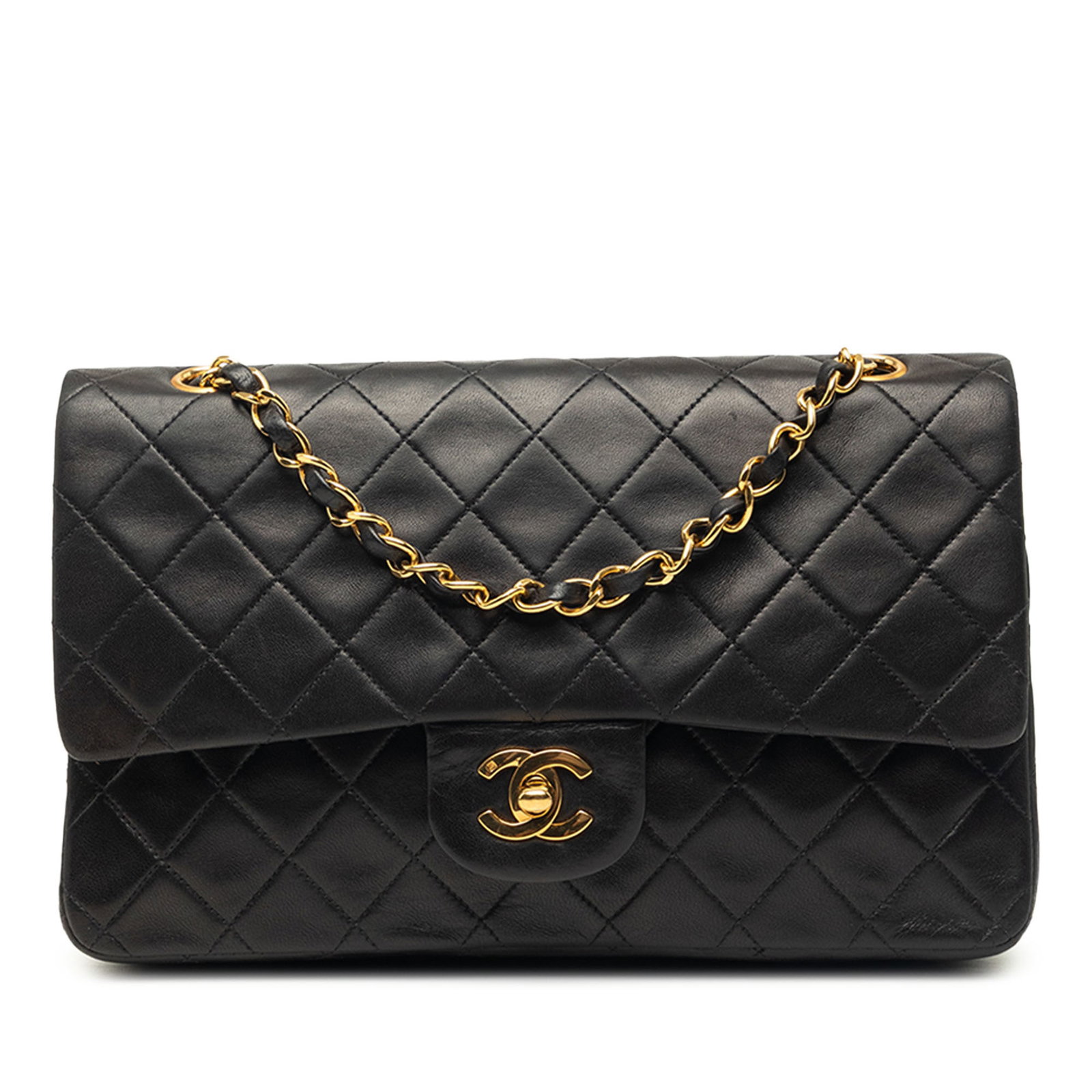 Chanel Medium Classic Double Flap Shoulder Bag Black Lambskin: Chanel Medium Classic Double Flap Shoulder Bag Black Lambskin A Chanel Medium Classic Lambskin Double Flap shoulder bag crafted in black quilted lambskin. This bag features a back slip pocket, leather