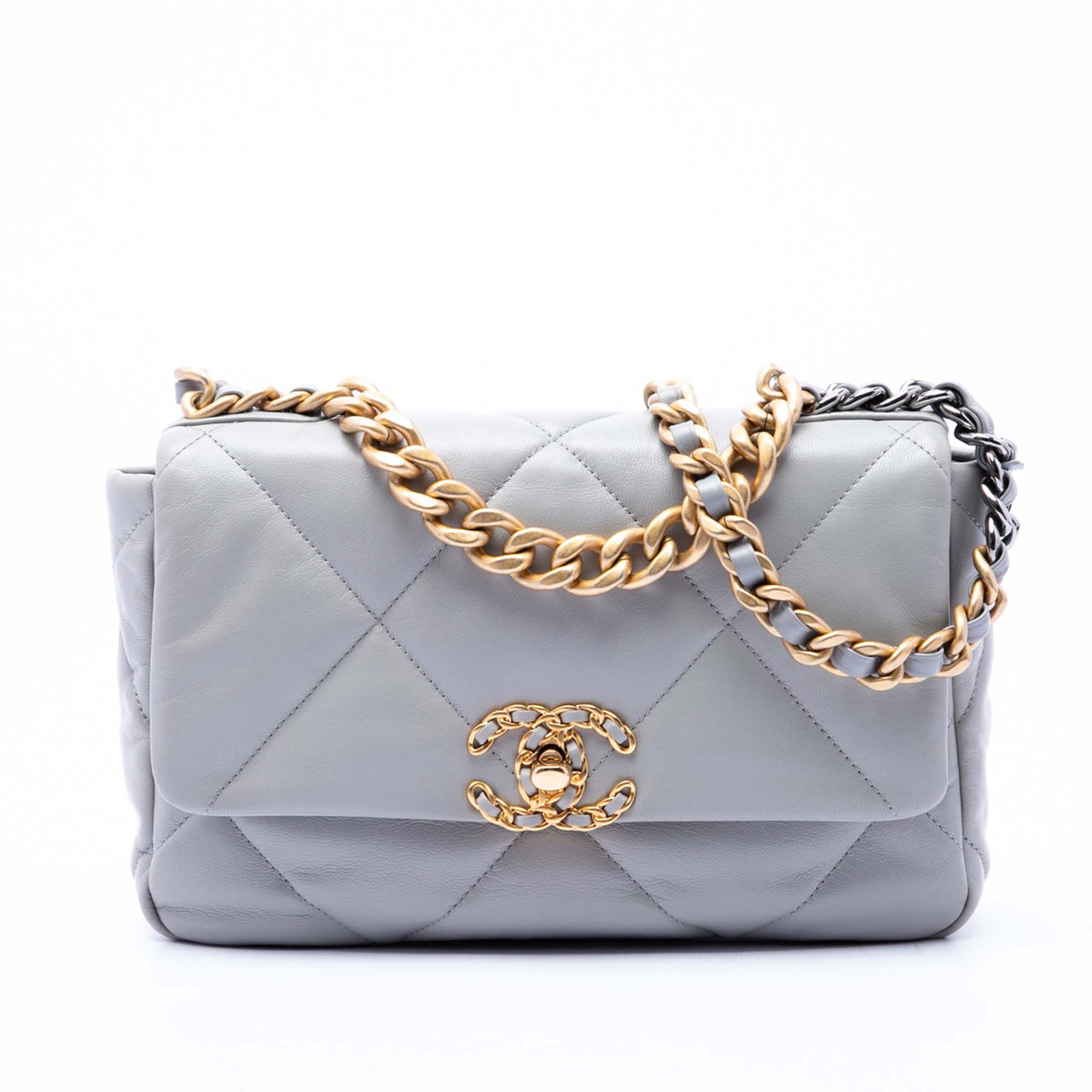 Chanel 19 Medium Flap Shoulder Bag Gray Lambskin: Chanel 19 Medium Flap Shoulder Bag Gray Lambskin The Chanel Medium 19 Flap bag is crafted in quilted lambskin leather and finished in gray with gold-tone chain link details. It features a flap with CC