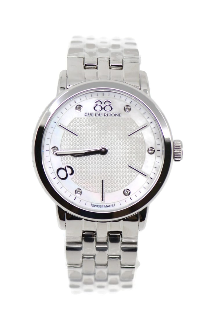 88 Rue du Rhone 87WA140006 quartz wristwatch stainless steel 35mm: 88 Rue du Rhone 87WA140006 quartz wristwatch stainless steel 35mm Pre-owned Rue Du Rhone wristwatch with a quartz movement and a stainless steel case and band. This unisex watch is made in Switzerland