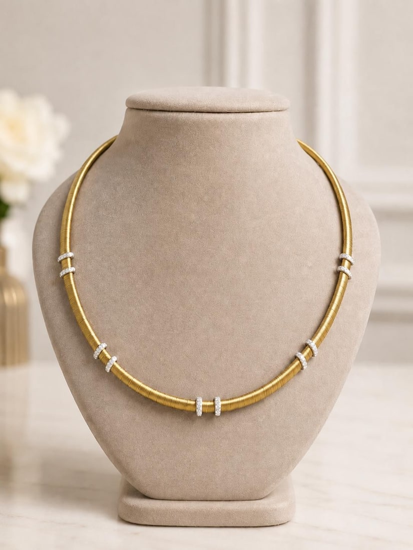 18k Yellow Gold Omega Necklace 16in with Pave Diamond Stations: 18k Yellow Gold Omega Necklace 16in with Pave Diamond Stations Pre-owned women's omega necklace crafted in solid 18k yellow gold with white gold accents. This silky weave flexible design features pave