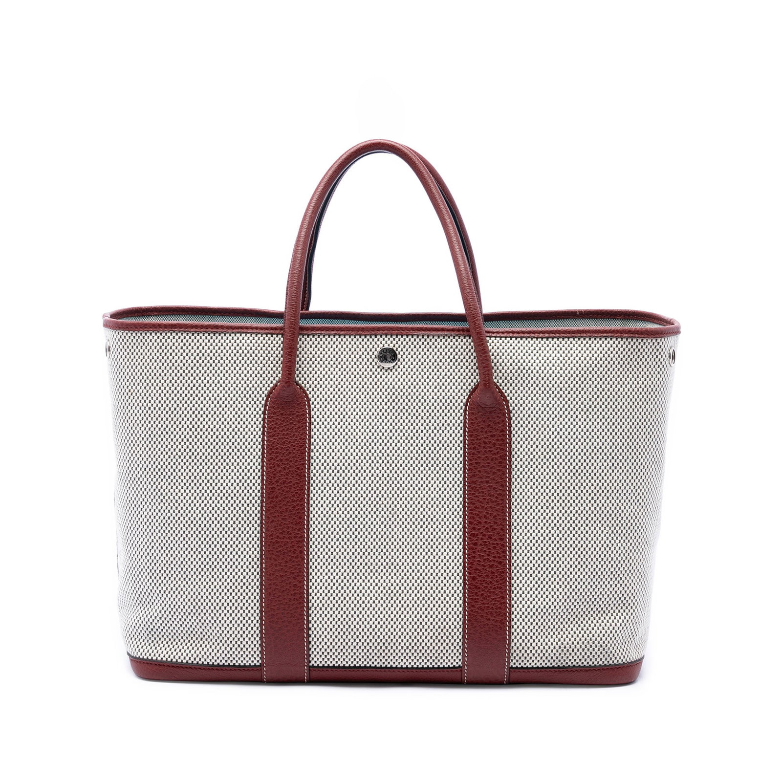 Hermes Garden Party 36 Toile Negonda Tote Bag: Hermes Garden Party 36 Toile Negonda Tote Bag This Hermes Garden Party 36 tote is crafted with a canvas body and Negonda leather trim, finished with rolled leather handles and an open top with snap bu
