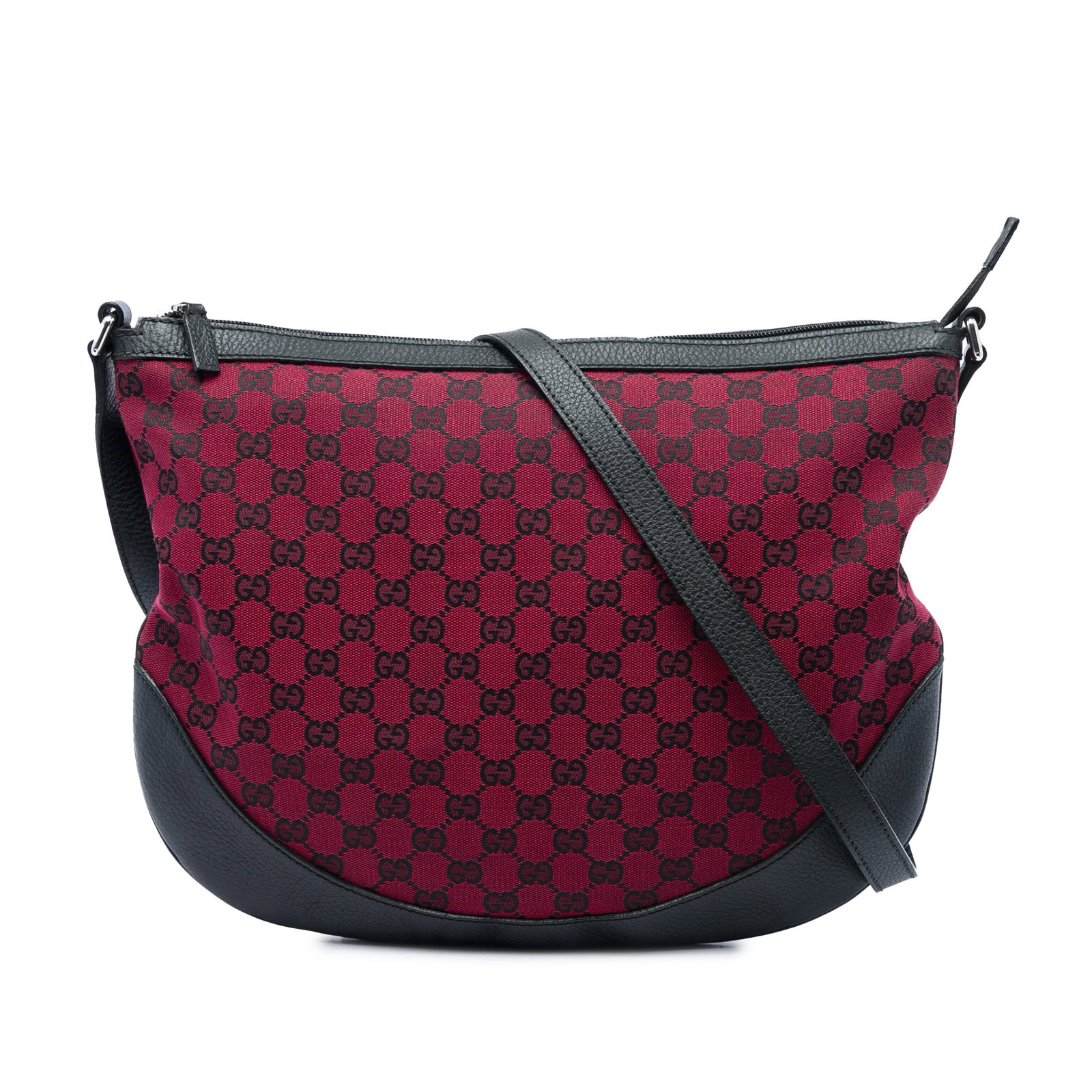 Gucci GG Canvas Red Crossbody Bag with Leather Trim: Gucci GG Canvas Red Crossbody Bag with Leather Trim Gucci GG Canvas Crossbody bag in red fabric with leather trim. This crossbody design features an adjustable flat leather strap, a top zip closure, a