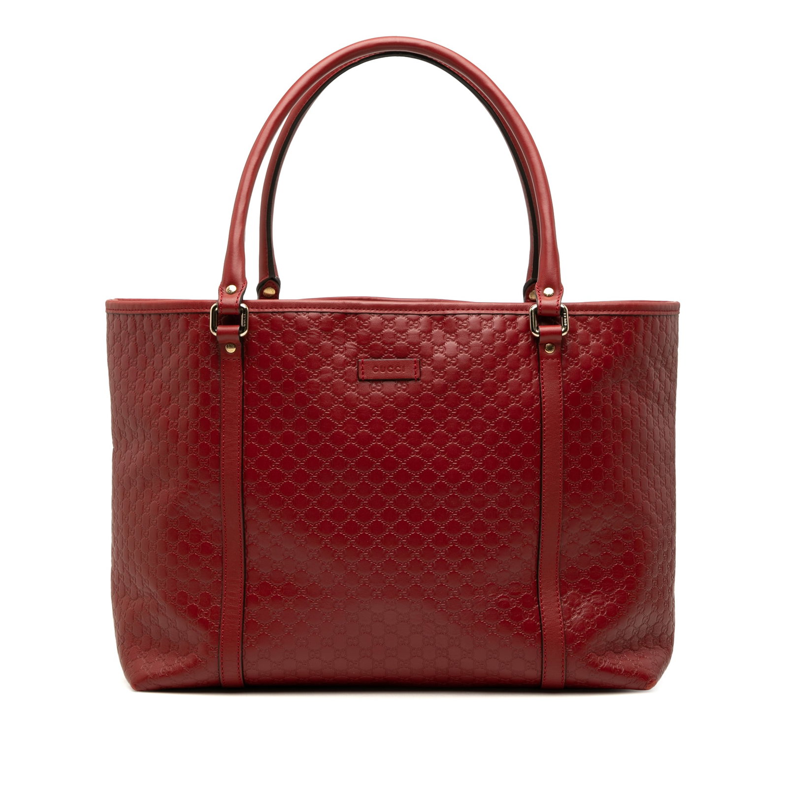 Gucci Joy Tote Red Microguccissima Embossed Leather Bag: Gucci Joy Tote Red Microguccissima Embossed Leather Bag Gucci Microguccissima Joy Tote in red embossed leather with rolled leather handles and an open top with magnetic snap closure. The interior incl