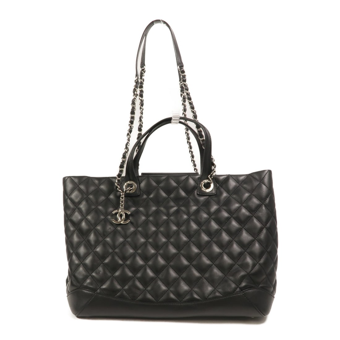 CHANEL CC Lambskin 2 Way Shoulder Tote Black SHW: CHANEL CC Lambskin 2 Way Shoulder Tote Black SHW Chanel CC tote bag in black lambskin leather with a 2-way shoulder design. This women's bag is made in France and features a black-on-black look with s