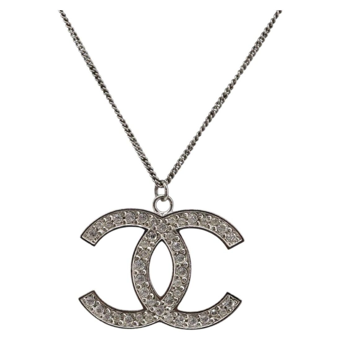 CHANEL Coco Mark CC Silver Tone Metal Necklace Authenticated: CHANEL Coco Mark CC Silver Tone Metal Necklace Authenticated Chanel Coco Mark stone necklace in silver-tone metal, made in France. This women's necklace features the iconic CC motif and comes as the n