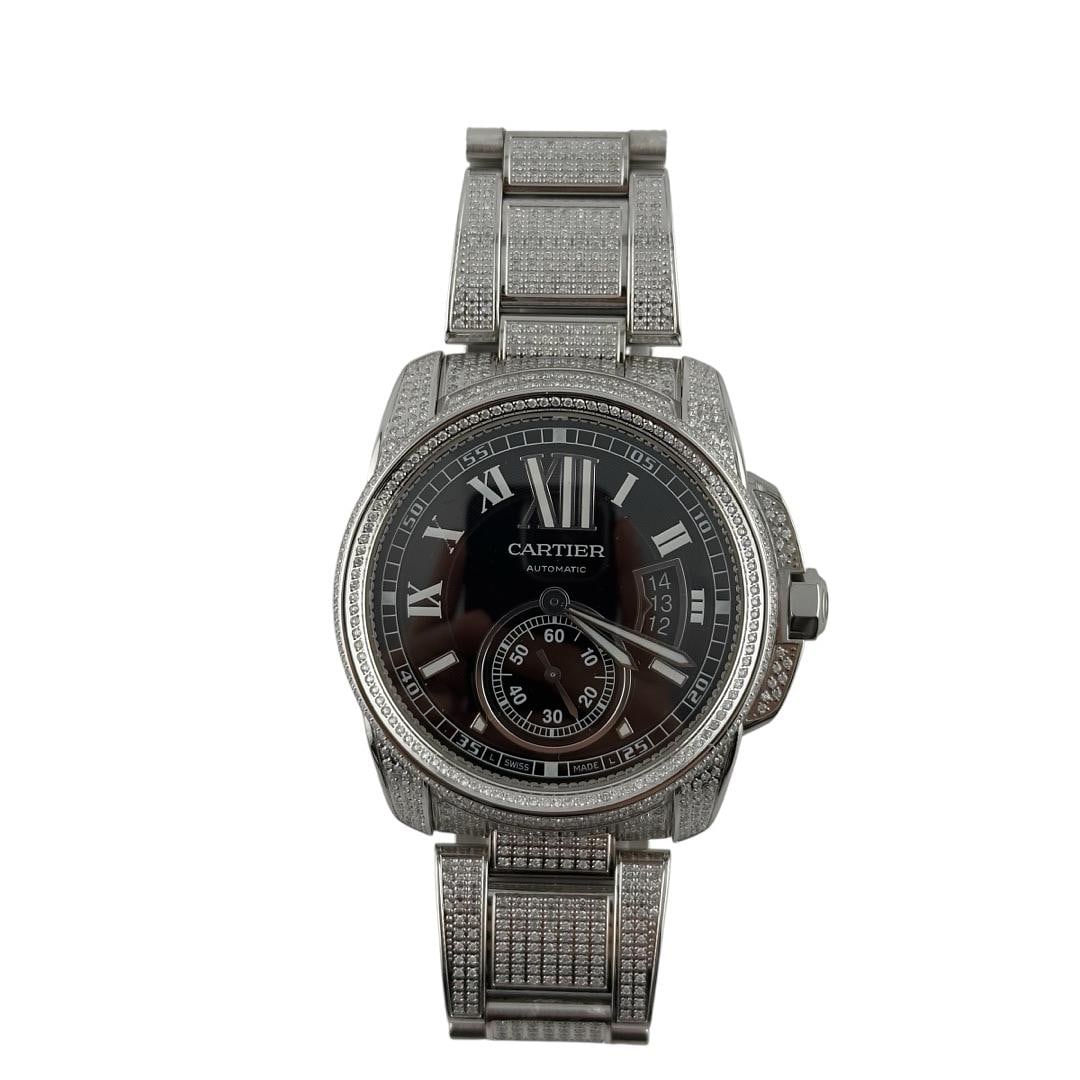 Cartier Calibre Ref 3389 Black Dial 42mm Stainless Steel Watch: Cartier Calibre Ref 3389 Black Dial 42mm Stainless Steel Watch This Cartier Calibre watch features a striking black dial and a 42mm stainless steel case. It is presented in very good condition and sho