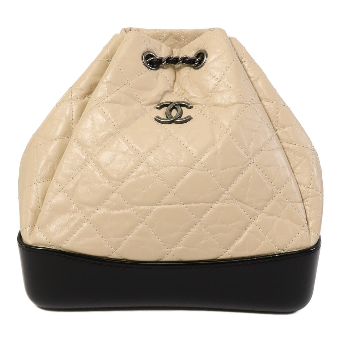 CHANEL Gabrielle A94485 beige calfskin chain backpack: CHANEL Gabrielle A94485 beige calfskin chain backpack A CHANEL Gabrielle backpack chain rucksack in beige calfskin leather. It features an inside open pocket and comes with storage bags and a hologram