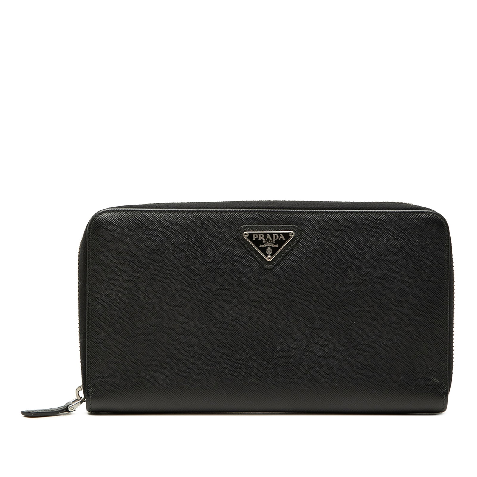 Prada Saffiano Travel Wallet in Black Leather Zip Around: Prada Saffiano Travel Wallet in Black Leather Zip Around Prada Saffiano Zip Around Travel Wallet in black leather with a zip-around closure, interior zip pocket, and slip pockets. Made in Italy. Condi
