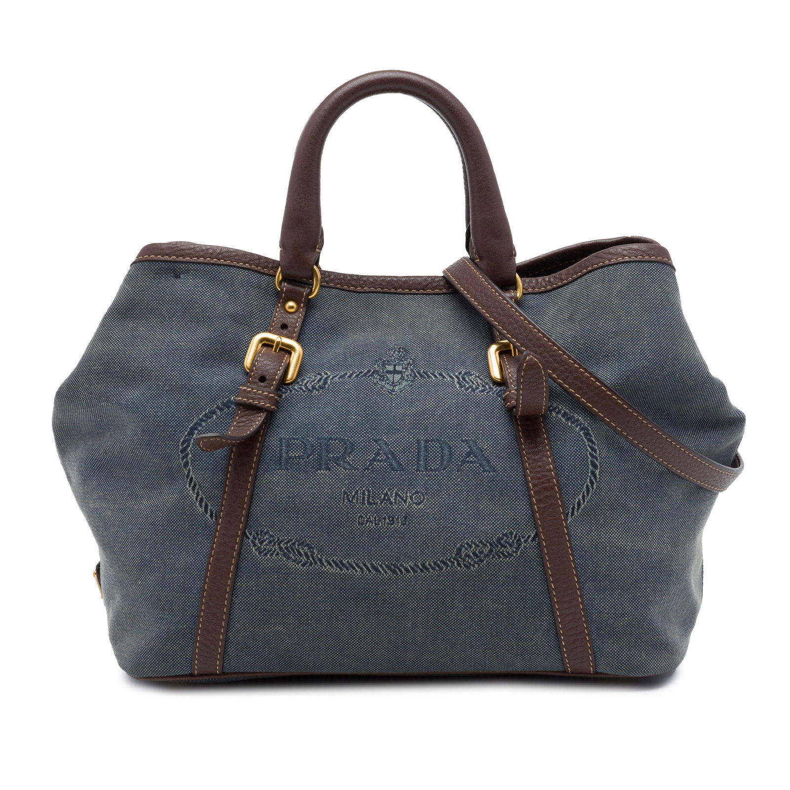 Prada Canapa Logo Satchel Blue Denim with Vitello Daino Trim: Prada Canapa Logo Satchel Blue Denim with Vitello Daino Trim Prada Canapa satchel in blue denim with Vitello Daino leather trim. This bag features rolled leather handles, a detachable and adjustable f