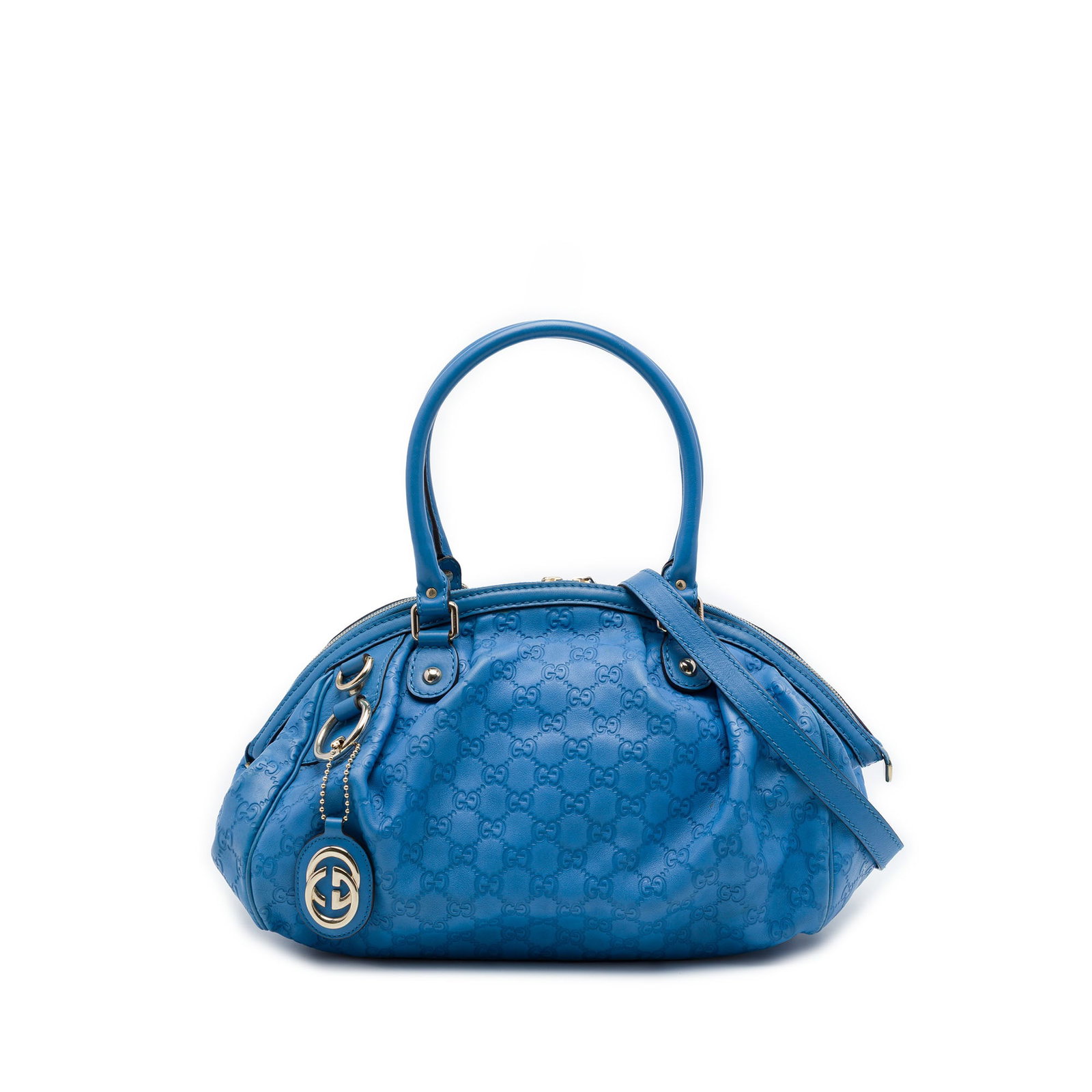 Gucci Guccissima Sukey Blue Leather Satchel Bag: Gucci Guccissima Sukey Blue Leather Satchel Bag A Gucci Guccissima Sukey satchel in blue embossed leather with rolled leather handles, a detachable flat leather strap, top zip closure, and an interior