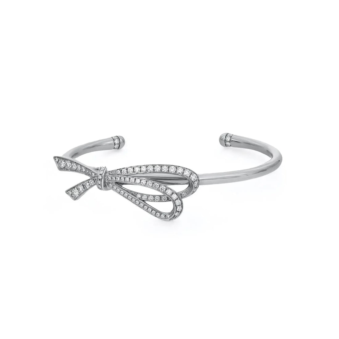 Tiffany & Co. 18K White Gold Diamond Bow Cuff Bracelet 0.37ct: Tiffany & Co. 18K White Gold Diamond Bow Cuff Bracelet 0.37ct Elevate your accessory collection with this stunning Tiffany & Co. Diamond Large Bow Cuff Bracelet, crafted from exquisite 18K white gold.