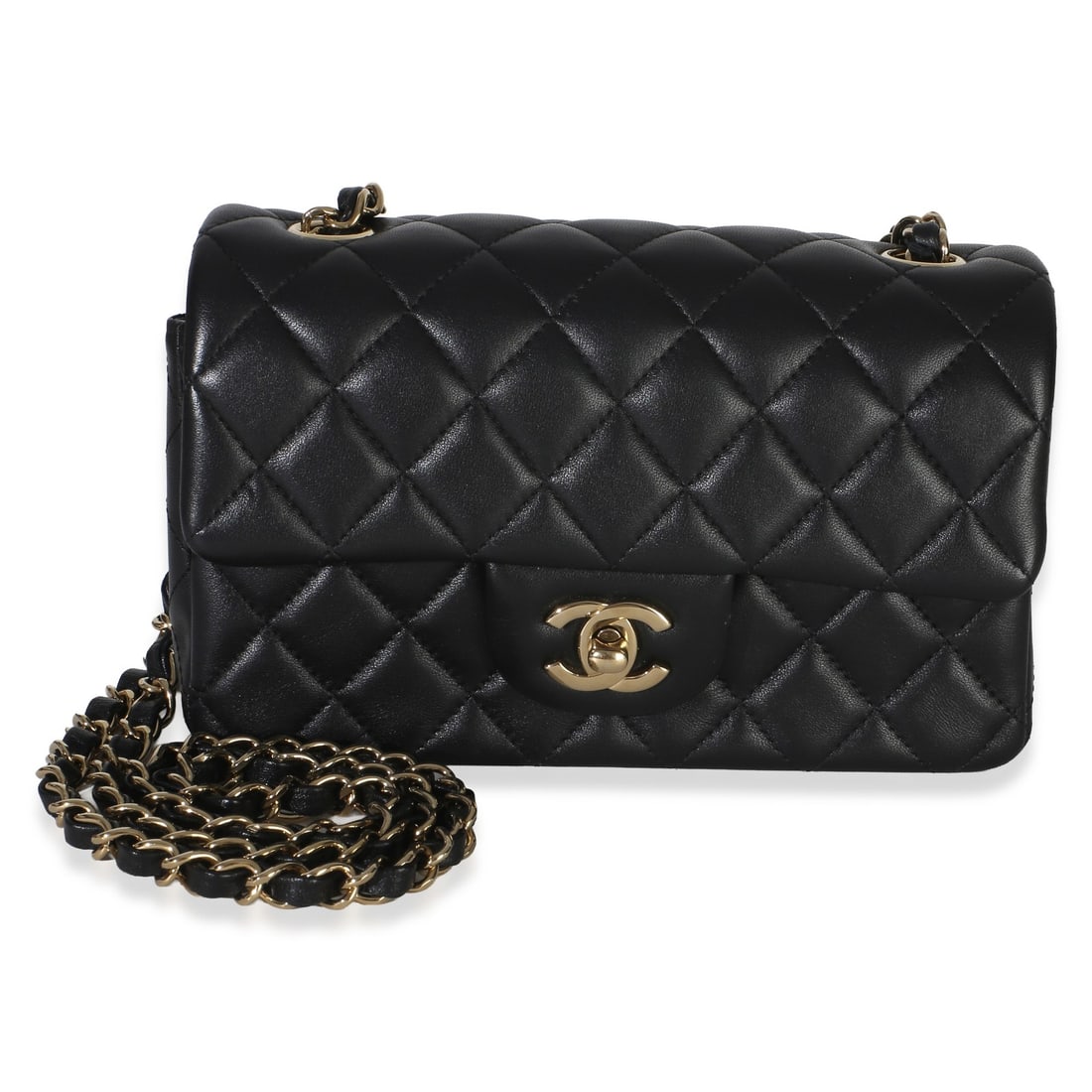 Chanel Mini Rectangular Flap Bag Black Quilted Lambskin: Chanel Mini Rectangular Flap Bag Black Quilted Lambskin Chanel Mini Rectangular Flap Bag in black quilted lambskin with a classic turnlock closure and black leather lining. This pre-owned shoulder bag