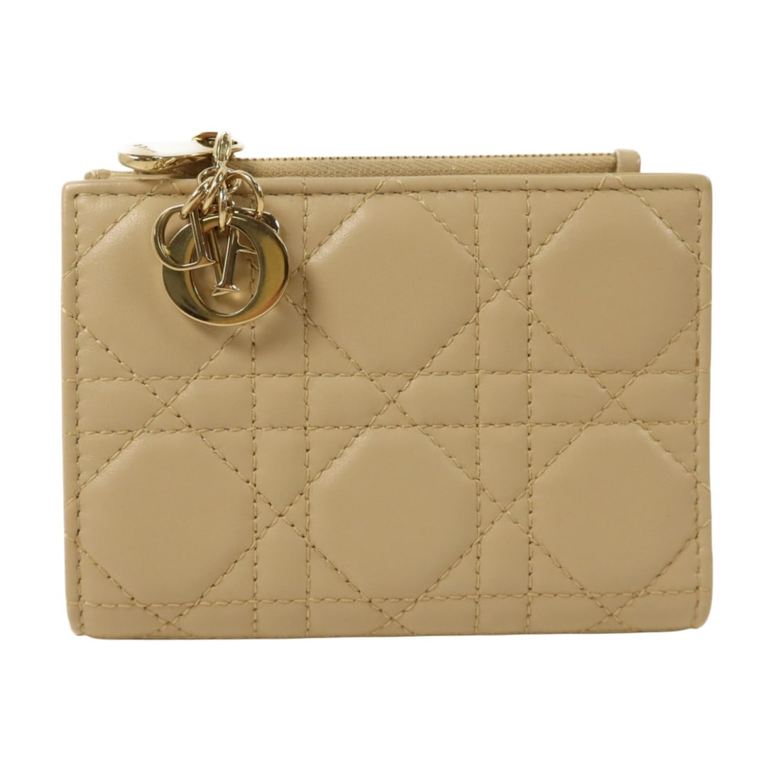 Dior Lady Dior Bi Fold Wallet Beige Calfskin S6037ONMJ_M51U: Dior Lady Dior Bi Fold Wallet Beige Calfskin S6037ONMJ_M51U Christian Dior Lady Dior bi-fold wallet in beige calfskin leather. This women's wallet features a compact fold-over design with a hook butto