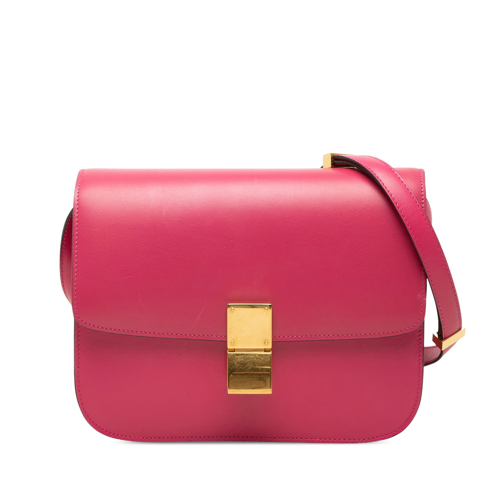 Celine Classic Box Medium Calfskin Crossbody Bag Pink: Celine Classic Box Medium Calfskin Crossbody Bag Pink A Celine Medium Calfskin Classic Box crossbody bag in pink leather with a structured silhouette and detachable flat strap. The design includes a f