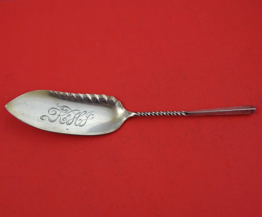 Whiting Twist #22 sterling silver jelly knife 9 1/4 in: Whiting Twist #22 sterling silver jelly knife 9 1/4 in Sterling silver jelly knife in the Twist #22 pattern by Whiting. This serving piece is monogrammed, with monograms that may vary, and is in excel