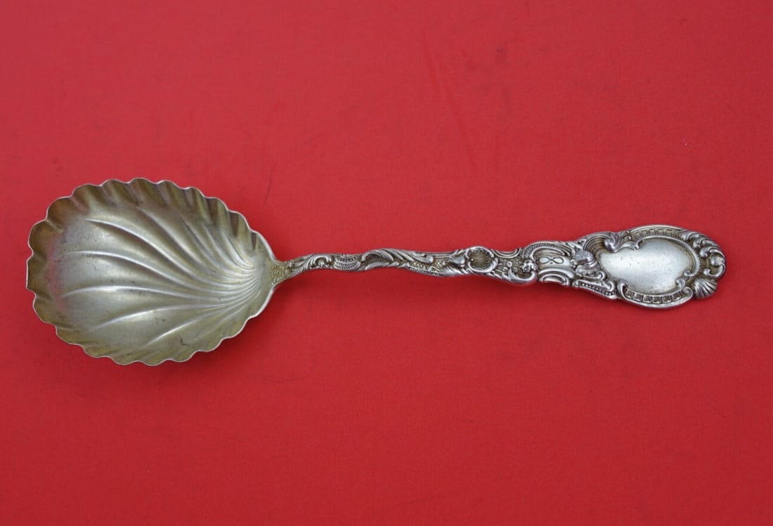 Durgin Louis XV Sterling Silver Berry Spoon 8 1/8 Inch: Durgin Louis XV Sterling Silver Berry Spoon 8 1/8 Inch This exquisite Durgin serving spoon features the elegant Louis XV pattern, crafted from high-quality sterling silver (.925). With a swirl bowl de
