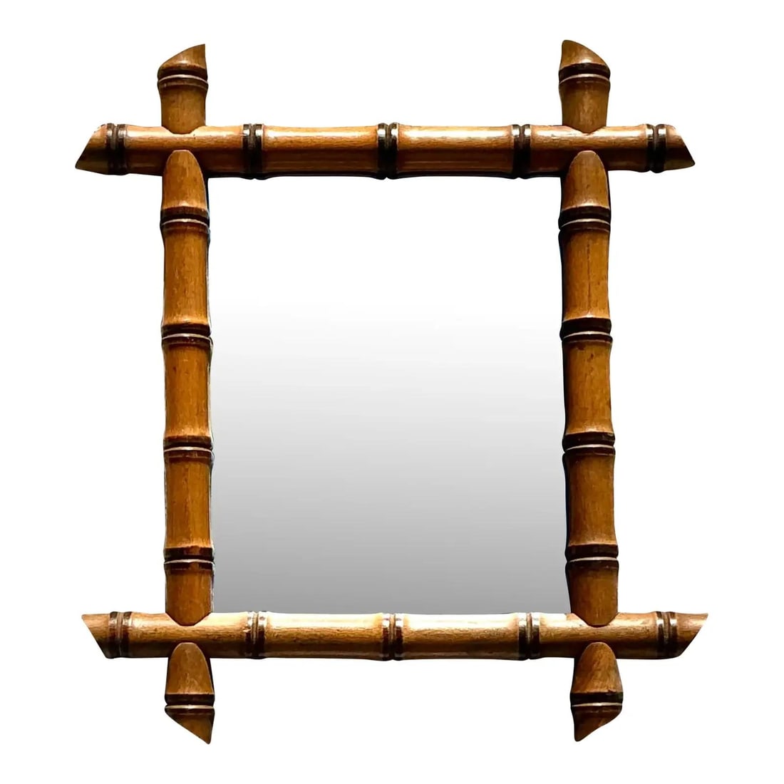 Oxford Style Wall Mirror in Tiger Bamboo with Honey Finish Boho Decor: Oxford Style Wall Mirror in Tiger Bamboo with Honey Finish Boho Decor This vintage wall mirror features a carved bamboo frame with a classic Oxford-style silhouette and overlapping, crossed corners. C