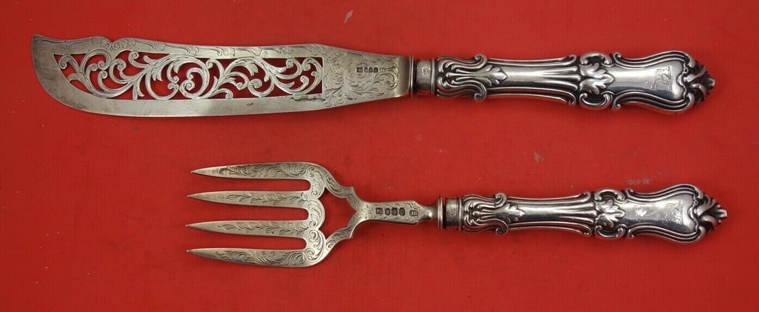 2-piece Victorian sterling silver fish serving set English 12 1/4: 2-piece Victorian sterling silver fish serving set English 12 1/4 English Victorian sterling silver fish serving set in a 2-piece configuration, featuring hollow sterling handles, pierced and bright-c