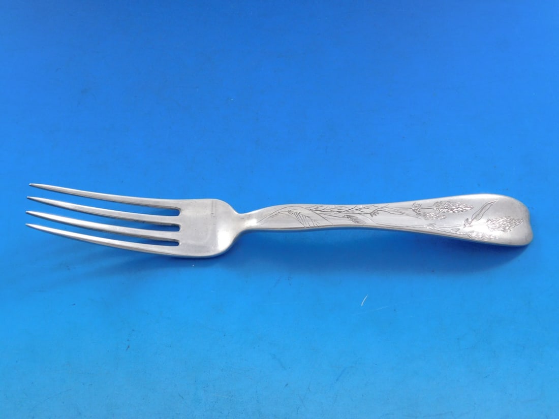 Tiffany Co Lap Over Edge Sterling Silver Fork Wheat Motif 7 1/4: Tiffany Co Lap Over Edge Sterling Silver Fork Wheat Motif 7 1/4 Tiffany & Co. sterling silver regular fork in the Lap Over Edge pattern with a wheat motif. It measures 7 1/4 inches and is monogrammed,