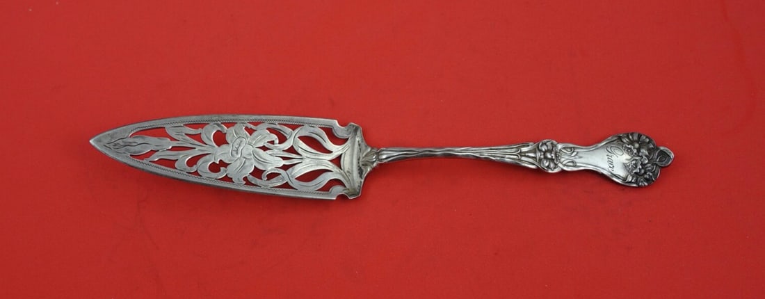 Alvin Majestic Sterling Silver Jelly Cake Server Orchid Blade 8 5/8": Alvin Majestic Sterling Silver Jelly Cake Server Orchid Blade 8 5/8" Sterling silver jelly cake server in the Majestic pattern by Alvin, featuring an orchid motif on the blade. This pre-owned serving 
