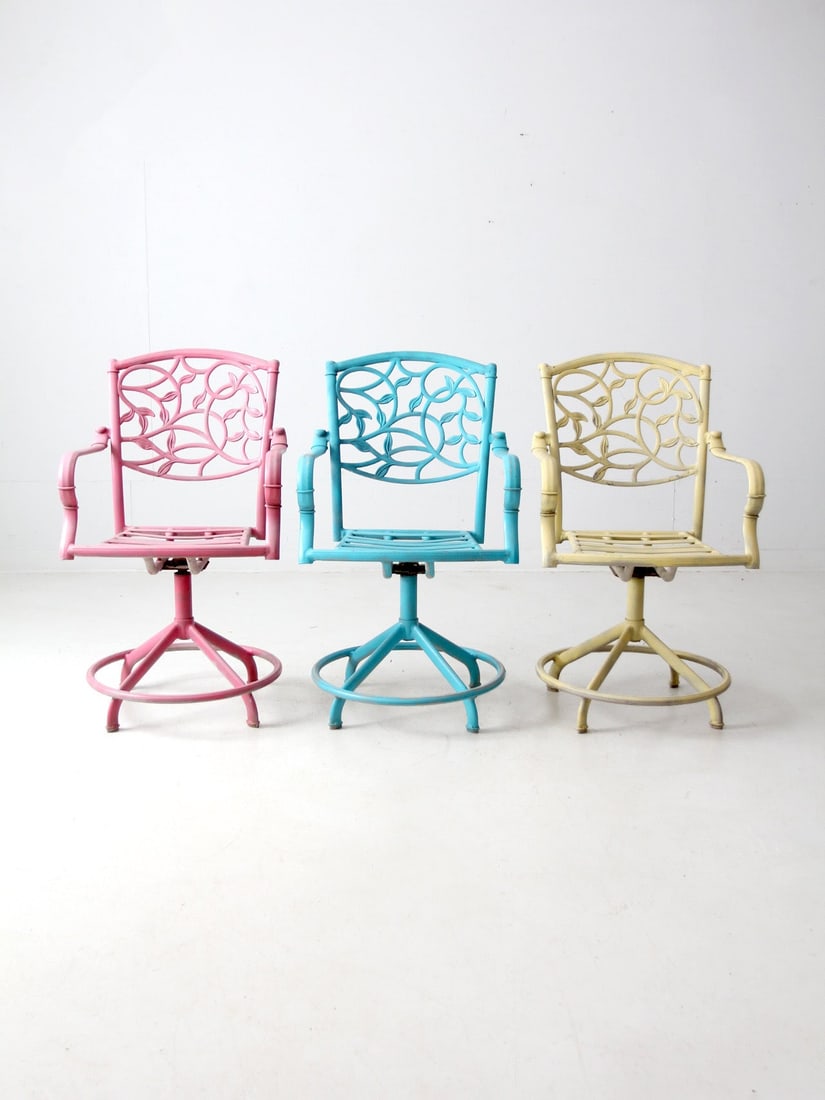 Colorful Set of 3 Vintage Metal Swivel Patio Chairs: Colorful Set of 3 Vintage Metal Swivel Patio Chairs Enhance your outdoor area with this vibrant set of three vintage metal swivel chairs. Each chair showcases a unique color: one in pink, one in aqua 