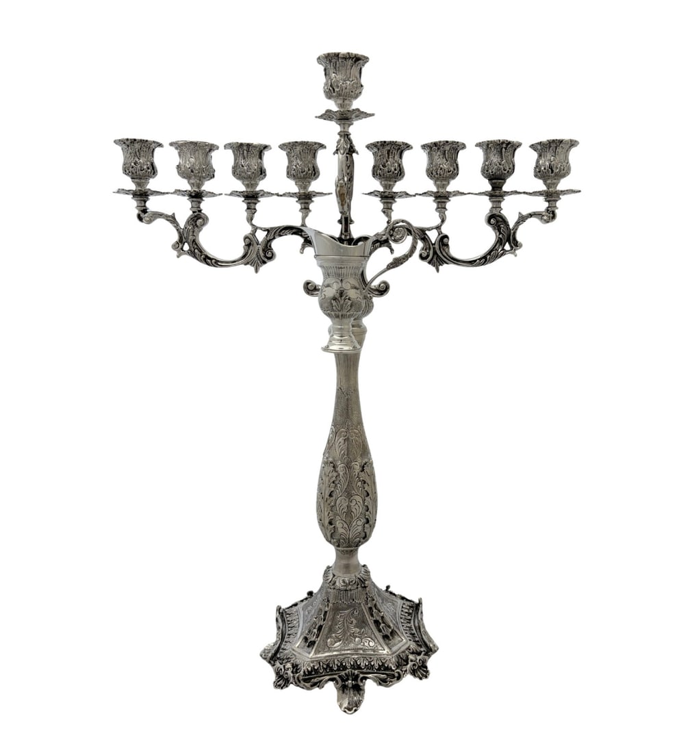 19.50 Inch Handmade Sterling Silver Chanukah Menorah with Leaf Applique: 19.50 Inch Handmade Sterling Silver Chanukah Menorah with Leaf Applique Fine handmade sterling silver Chanukah menorah with chased leaf applique and ornate detailing. The design features matte and shi