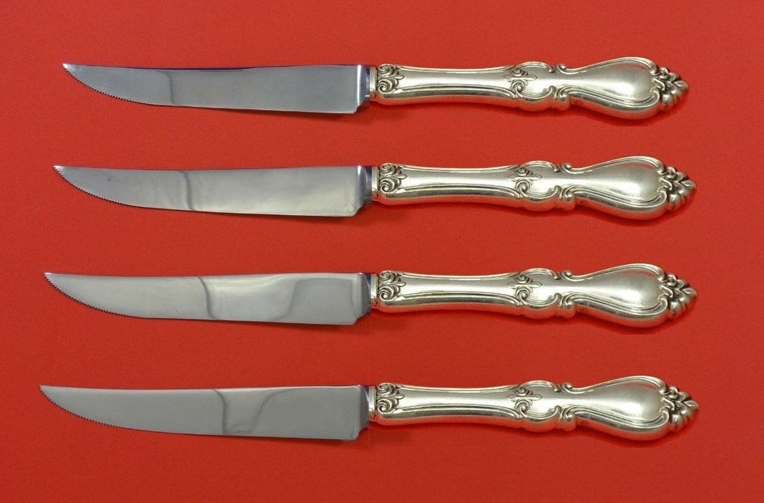 4-piece Towle Queen Elizabeth I sterling steak knives custom made: 4-piece Towle Queen Elizabeth I sterling steak knives custom made Custom made 4-piece steak knife set in the Queen Elizabeth I pattern by Towle. Each knife features a sterling silver hollow handle wit