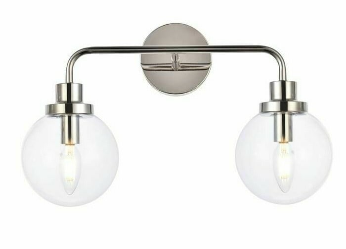 Hanson 2-Light Wall Sconce Polished Nickel Clear Glass: Hanson 2-Light Wall Sconce Polished Nickel Clear Glass Modern 2-light wall sconce with a polished nickel finish and clear glass shade. It is hardwired, dimmable, and rated ETL dry. The fixture is desi