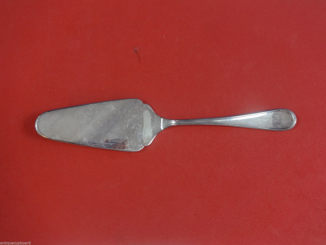 Ricci Ascot Sterling Silver Pie Server 10 1/4 Inches: Ricci Ascot Sterling Silver Pie Server 10 1/4 Inches This elegant pie server features a flat handle and is crafted from high-quality sterling silver, showcasing the classic Ascot pattern by Ricci. Mea
