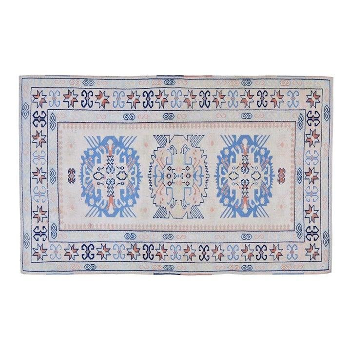 4'2"x6'6" Hand Knotted Wool Anatolian Rug Turkish Vintage: 4'2"x6'6" Hand Knotted Wool Anatolian Rug Turkish Vintage This vintage Turkish Oushak rug is hand-knotted from wool, showcasing traditional craftsmanship with a modern design sensibility. Its durable 